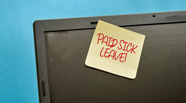 sticky note said paid sick leave
