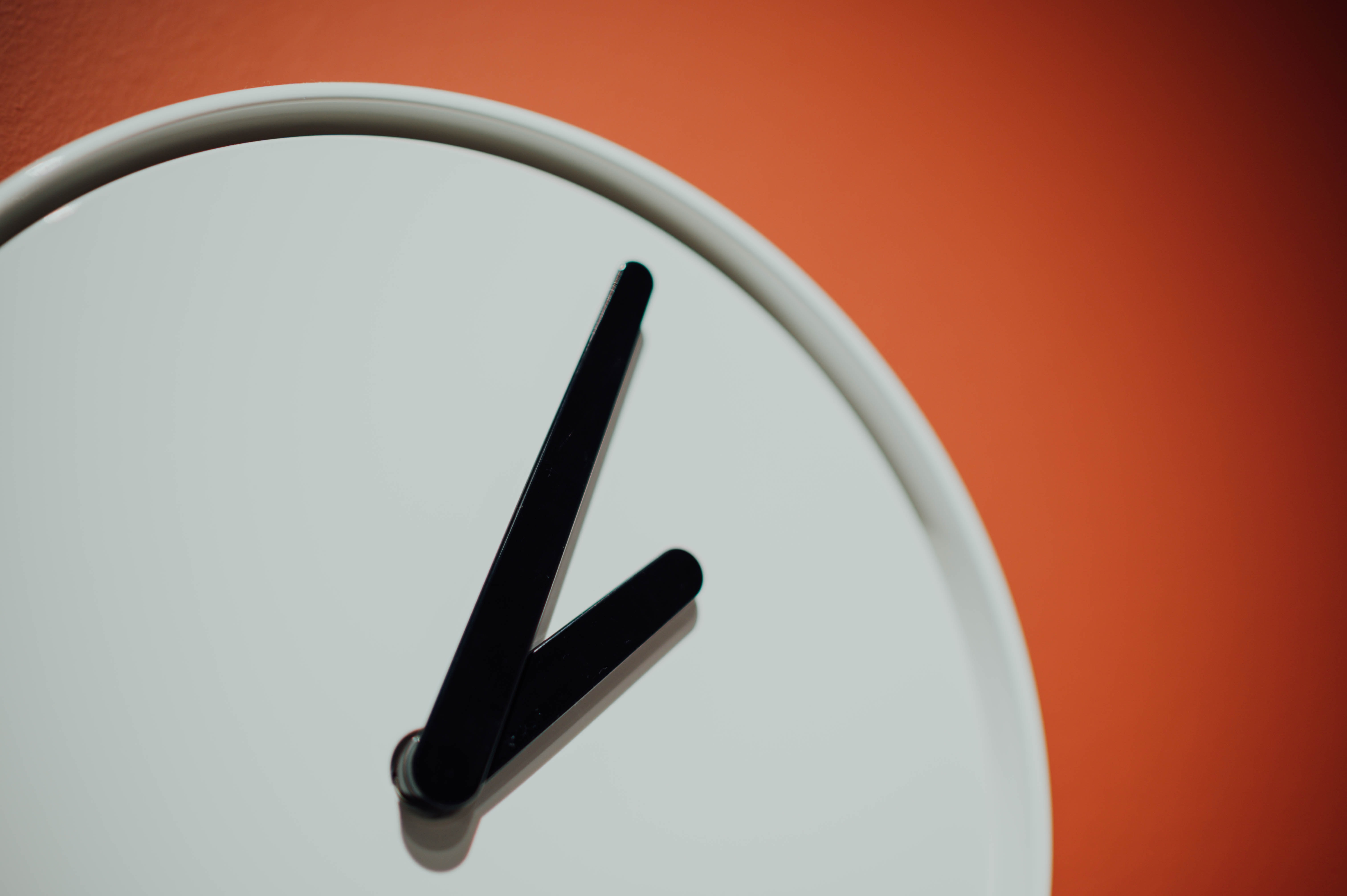 clock with dial on orange background